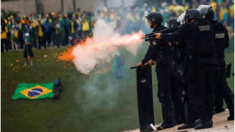 Security forces operate as supporters of Brazil's former President Jair Bolsonaro demonstrate against President Luiz Inacio Lula da Silva, outside Brazil's National Congress in Brasilia