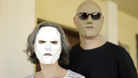 Maria and Arthur, members of Team Ninja Trollhunters, stand next to each other wearing face masks to hide their identity