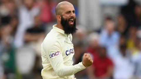 England spinner Moeen Ali celebrates taking a wicket in a Test