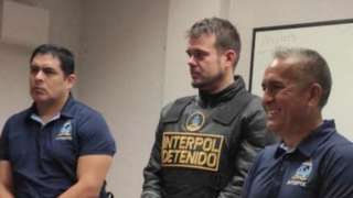 Dutch citizen Joran van der Sloot, who was serving a 28-year sentence in Peru after confessing to killing a 21-year-old Peruvian woman, stands with security forces previous to his extradition to the U.S., to face charges of extortion and wire fraud against the family of Natalee Holloway, in a case linked to his alleged involvement in the disappearance of Natalee Holloway in Aruba in 2005, in Lima, Peru June 8, 2023.