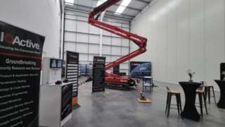 A cherry picker inside IOActive's cyber security lab