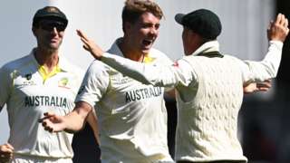 Cameron Green celebrates taking a wicket