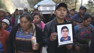 Relatives mourn massacre victims in Comitancillo, Guatemala, March 2021