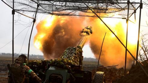 A Ukrainian soldiers fires a cannon. File photo