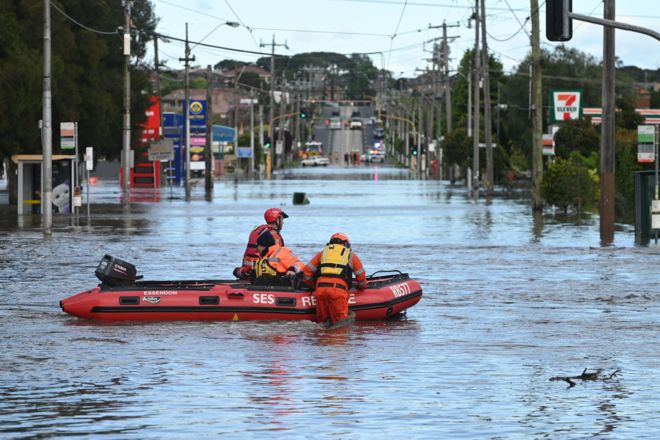Rescue workers in floodwaters in Melbourne, Australia in October 2022