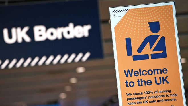 UK border signage is pictured at the passport control in Arrivals in Terminal 2 at Heathrow Airport in London on July 16, 2019