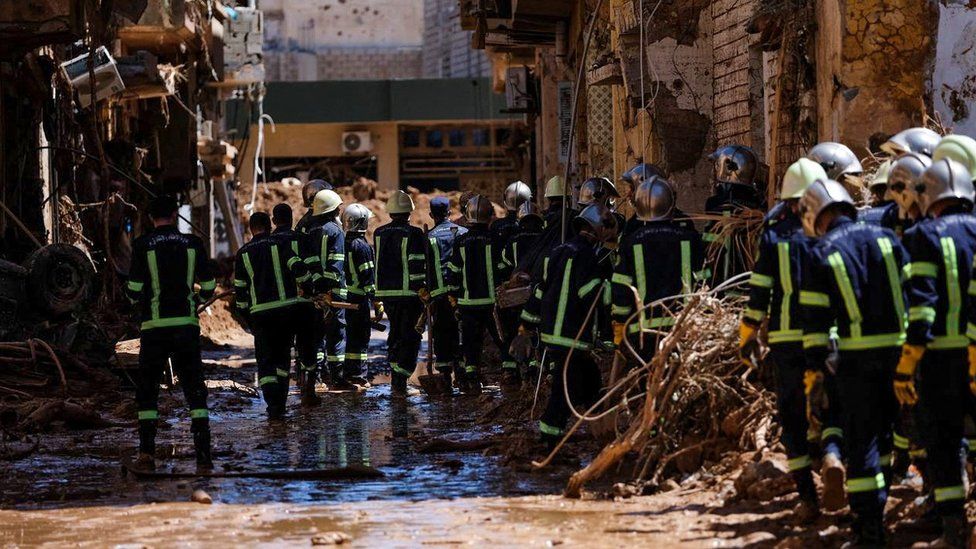 Members of the rescue team from the Egyptian army inspect the damaged areas