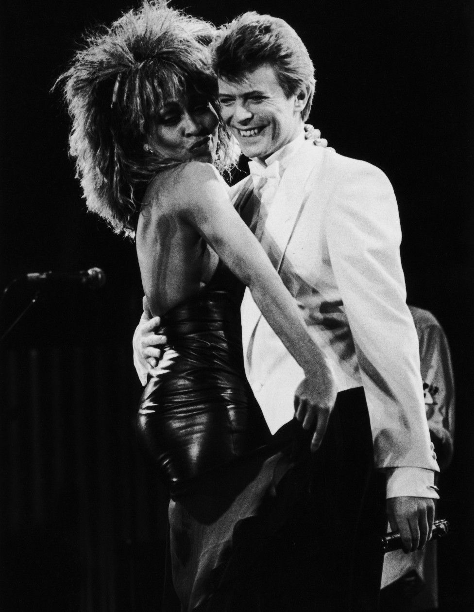 Singers David Bowie and Tina Turner perform on stage at the NEC Birmingham.