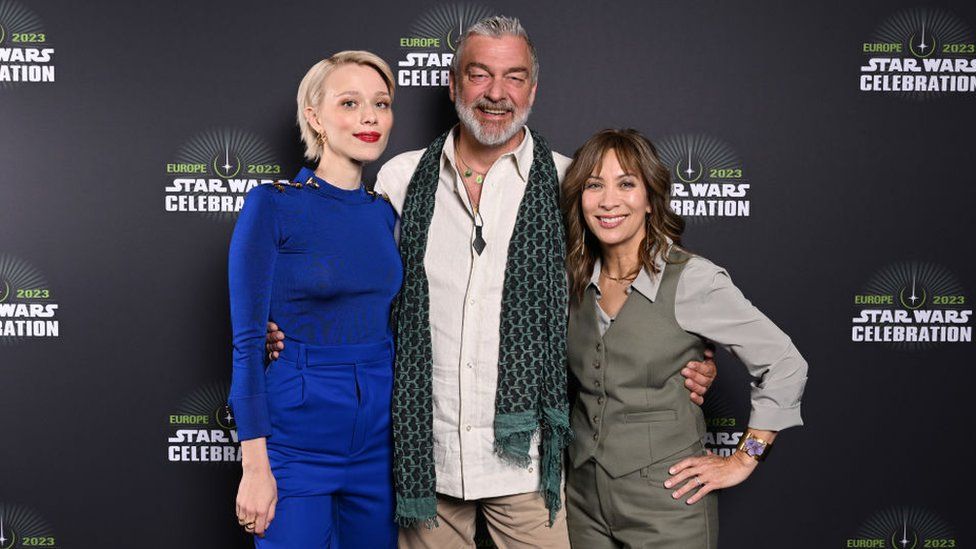 Ivanna Sakhno, Ray Stevenson and Diana Lee Inosanto pose for photos at a Star Wars event