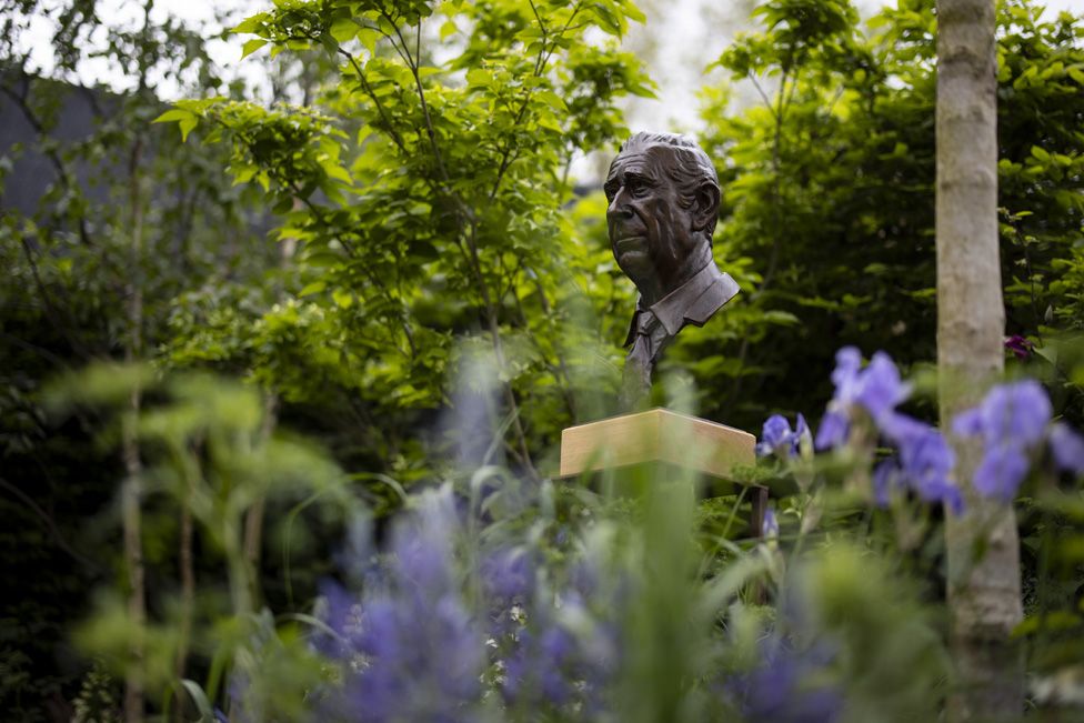 A bronze head of Britain's King Charles III installed as Part of the RHS Garden of Royal Reflection and Celebration designed by Dave Green to celebrate Britain's King Charles III's coronation, at Chelsea Flower Show in London, Britain, 22 May 2023.