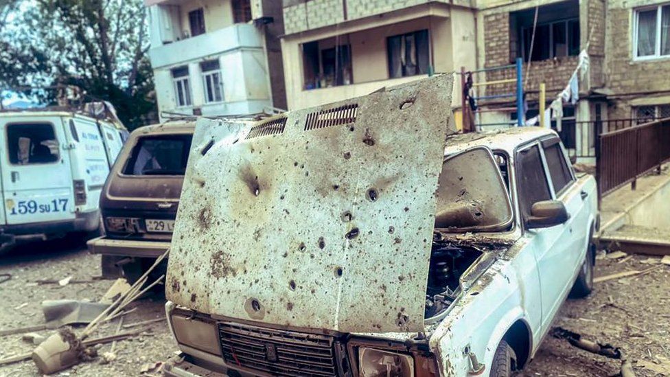 A handout photo made available by OC Media shows damage to residential buildings and vehicles in Stepanakert, Nagorno-Karabakh