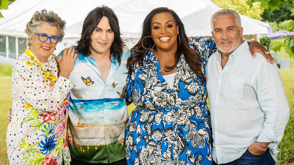 Left-right: Dame Prue Leith, Noel Fielding, Alison Hammond and Paul Hollywood in a promotional shot for the new series of The Great British Bake Off