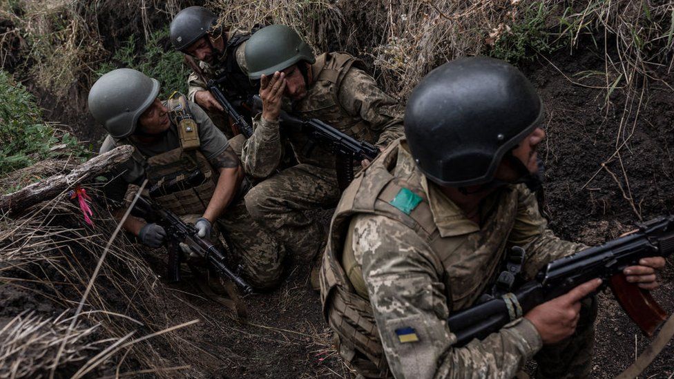 Ukrainian troops in a trench